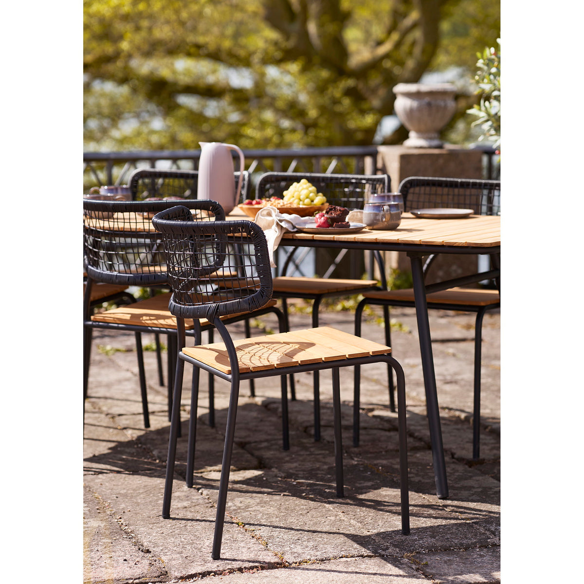 Scaun de dining, tec/poliratan, negru/natur, picioare negre